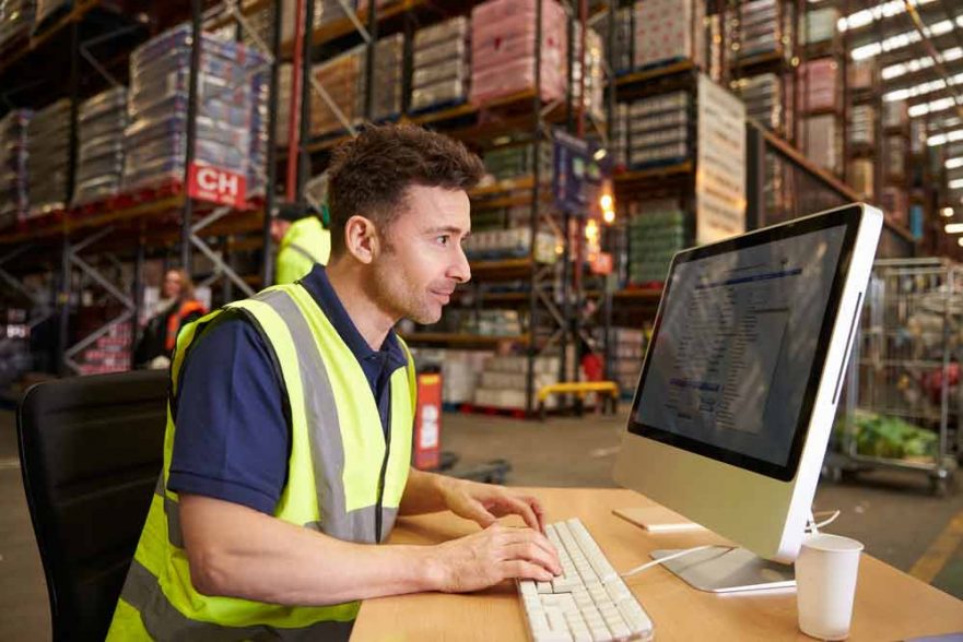 Image of a male labour working in a warehouse