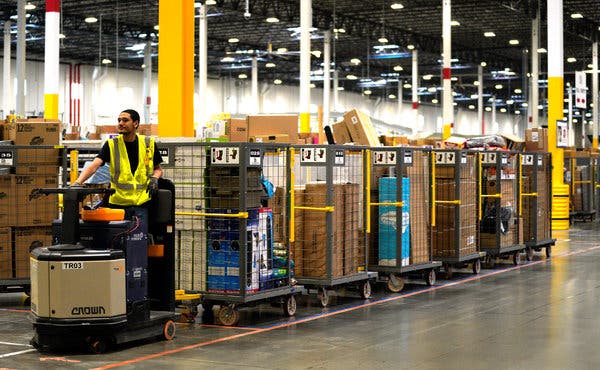 Image showing a man with forklift in a industrial warehouse